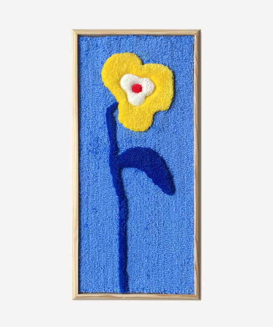 La fleur à la tige bleu